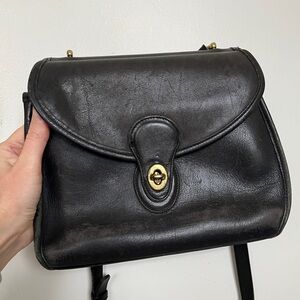 Vintage Black Leather Coach crossbody purse.